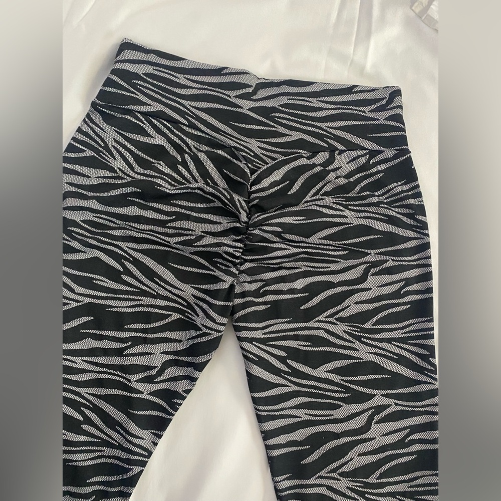 NEVER WORN!!! Zebra patterned Leggings